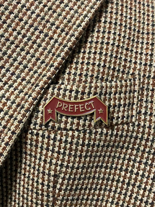 Vintage garnet and gold prefect pin magical world